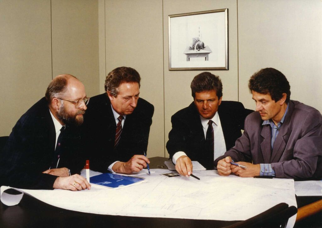 The founders of SAP sit together at one table